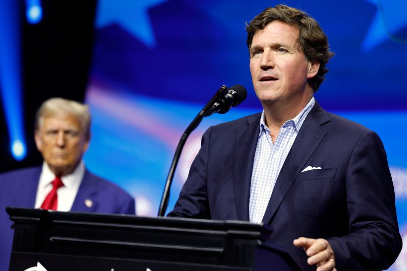 Tucker Carlson says father Trump will give ‘spanking’ at rowdy Georgia rally