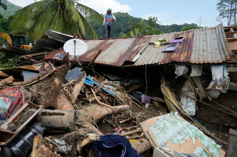 At least 126 dead and missing in massive flooding and landslides in Philippines